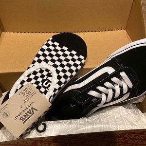 Old Skool Vans black and white with no show Vans socks.